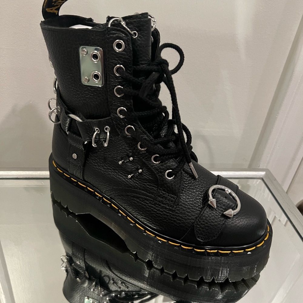 Brand new Dr. Martin. Never worn boxes included.